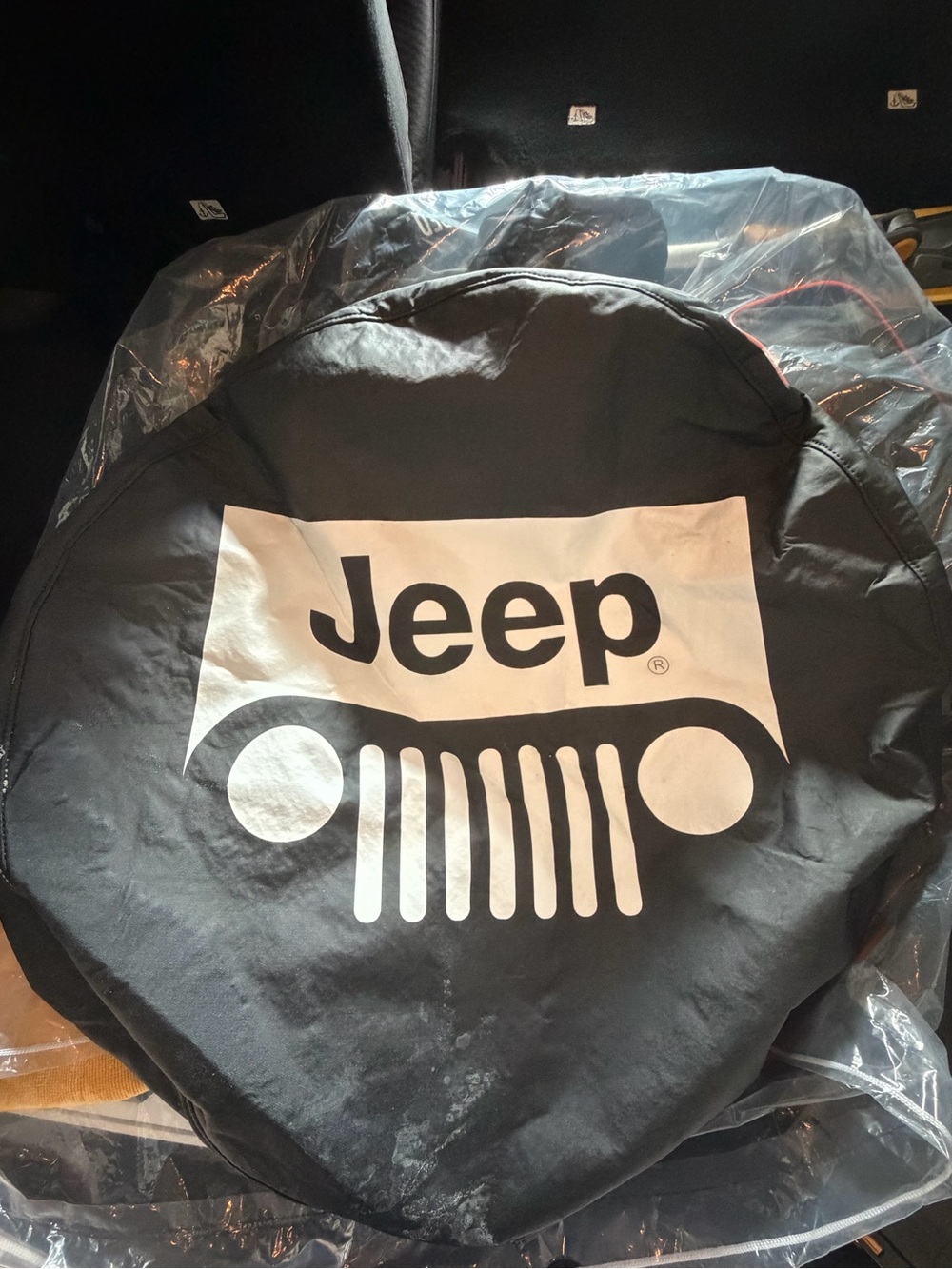 Jeep Black and White Logo Spare Tire Cover. Jeep grill logo
